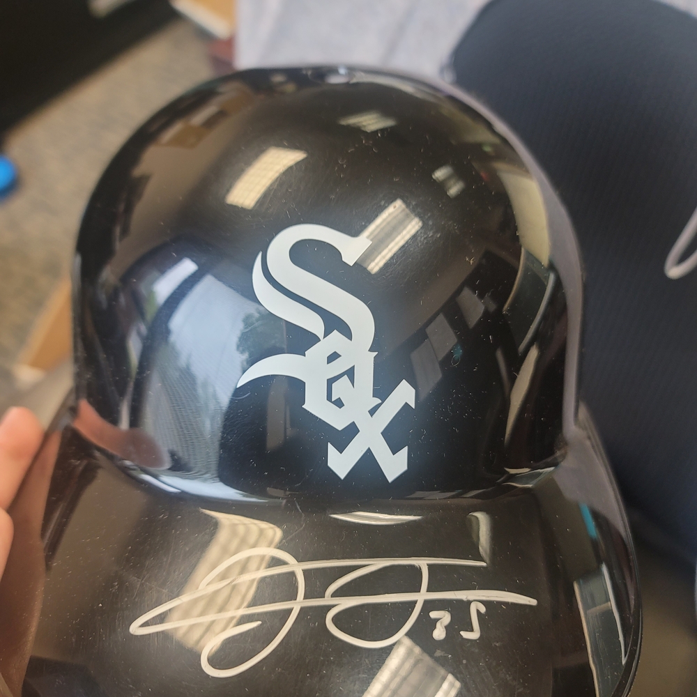 Black Baseball Helmet with White Sox Logo